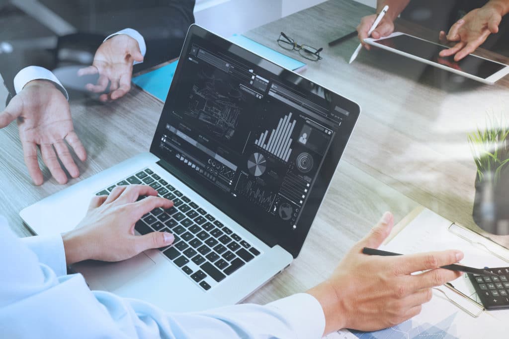 Business,documents,on,office,table,with,smart,phone,and,laptop